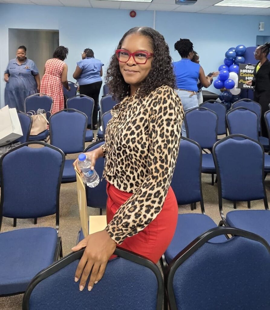 Smiling HRMAB member at the HR Professional Day celebration