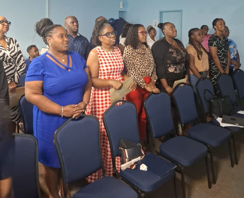 New HRMAB members standing together during the induction ceremony